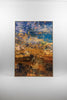 “A Beautiful Transition” artwork by Durham J White, featuring a layered photographic artwork of coastal land and sea formations in warm ochres, sandy hues, and rich coastal blues.