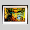 “A Sea Beyond” glass framed fine art print by Durham J White, featuring a layered photographic artwork of the Macedon Ranges in lush forest greens, radiant sunset golds, warm orange-yellows, and subtle atmospheric blues in a studio setting.