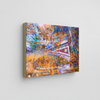 "Bridge to Dreams" archival canvas print by Durham J White, featuring a layered photographic artwork of Melbourne's Princes Bridge and city skyline in vibrant blues, luminous golds, and ember-like reds.