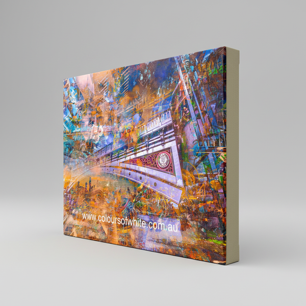 “Bridge to Dreams” archival canvas print by Durham J White, featuring a layered photographic artwork of Melbourne’s Princes Bridge and city skyline  in deep blues, radiant golds, and ember-like reds.