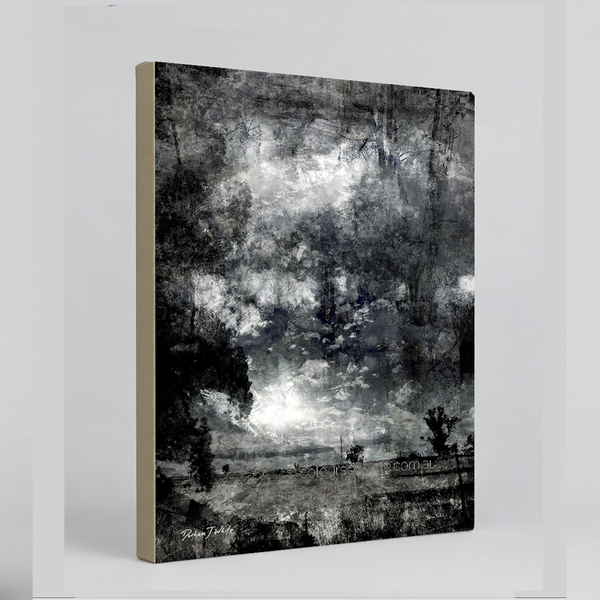 “Etched” archival canvas print by Durham J White, featuring a monochrome layered photographic artwork of the central Victorian countryside and expansive cloudscapes in carbon blacks, charcoal mid-tones, and crisp whites.