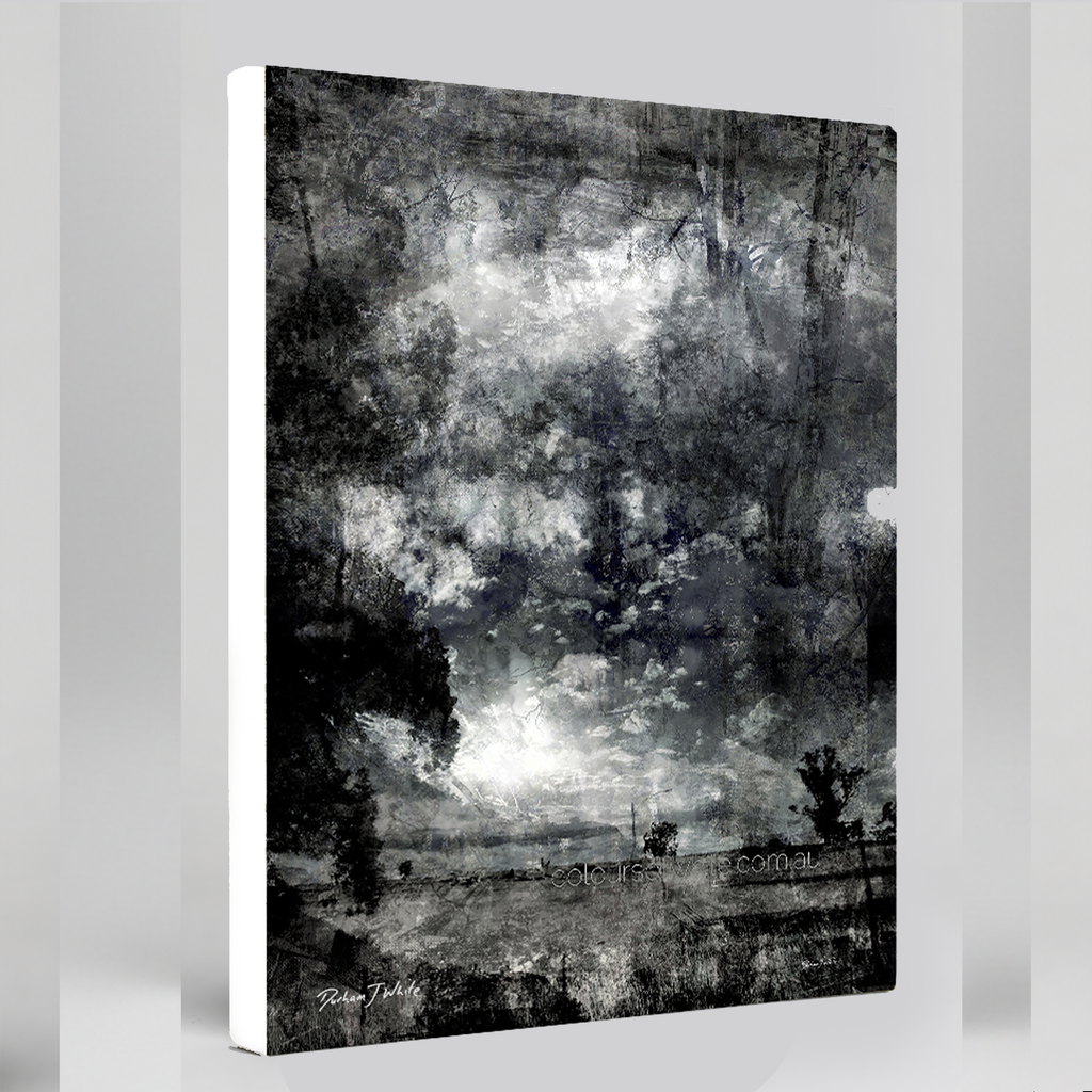 “Etched” archival canvas print by Durham J White, featuring a monochrome layered photographic artwork of the central Victorian countryside and expansive cloudscapes in carbon blacks, charcoal mid-tones, and crisp whites.