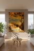 “Floating” archival canvas print by Durham J White, featuring a layered photographic artwork of Kyneton architecture reflections in radiant golden yellows, soft khakis, and rich amber tones styled in an apartment living room.