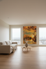 “Floating” archival canvas print by Durham J White, featuring a layered photographic artwork of Kyneton architecture reflections in radiant golden yellows, soft khakis, and rich amber tones styled in a minimal apartment living space.