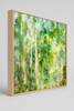 “Forest Dwelling” box framed archival canvas print by Durham J White, featuring a layered photographic artwork of the Trentham countryside with neutral greens, warm earthy tones, and a soft painterly finish.