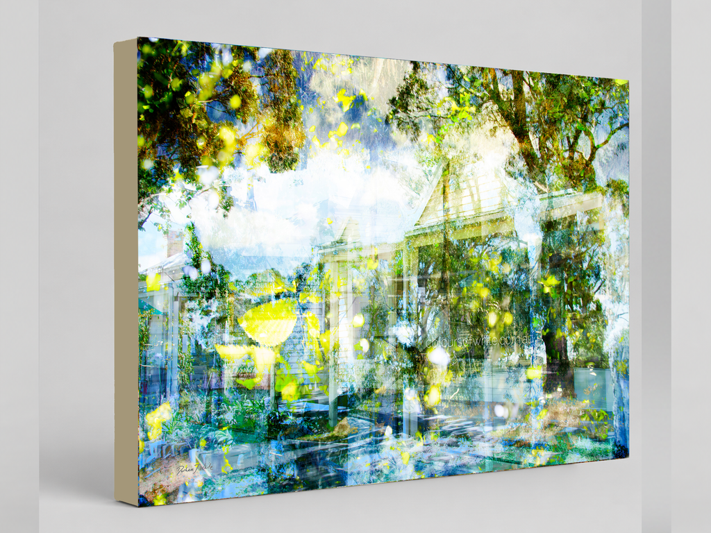 "Glisten" archival canvas print by Durham J White, featuring a layered photographic artwork of a Trentham garden with a heritage cottage, fresh sky blues, soft aqua, lime-green leaves, and dappled summer sunlight.