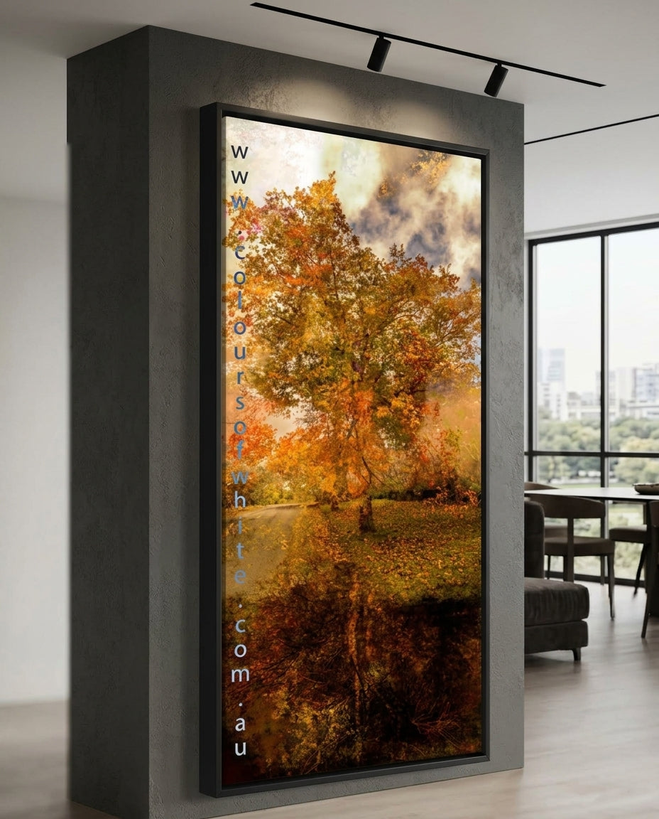 “Grounded” satin black box framed ChromaLuxe metal print by Durham J White, featuring a layered photographic artwork of Honour Avenue in Macedon in saturated burnt oranges, amber tones, and radiant golden yellows. Modern room styled sample.