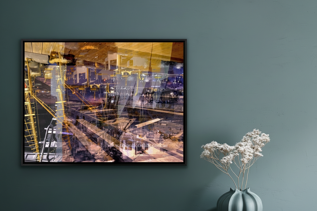 “Keeping Up a Pier Glance 3” Chromaluxe metal print by Durham J White, featuring a layered photographic artwork of the Mornington waterfront in earthy purples, sandy caramel, and salt-weathered ochre tones styled in a satin black matt frame in a teal blue interior.