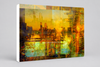 Melbourne Golden Skyline – archival canvas print urban landscape by Durham J White. Melbourne's skyline at golden hour in amber, burnt orange and gold tones with teal and aqua accents — a layered photographic composition capturing the city from the west.