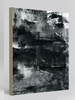 "Moonwalking" archival canvas print by Durham J White, featuring a monochrome layered photographic artwork of Mornington Pier with a lone figure and boats, in deep carbon blacks, graphite mid-tones, and crisp whites.