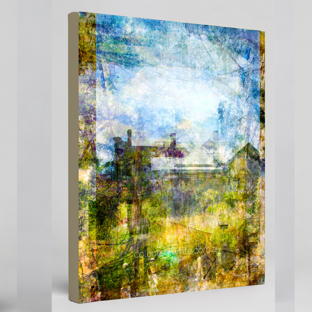 “Quaint” archival canvas print by Durham J White, featuring a layered photographic artwork of Trentham rooftops and chimneys in soft sky blues, crisp whites, and deep garden greens beneath a luminous sky.