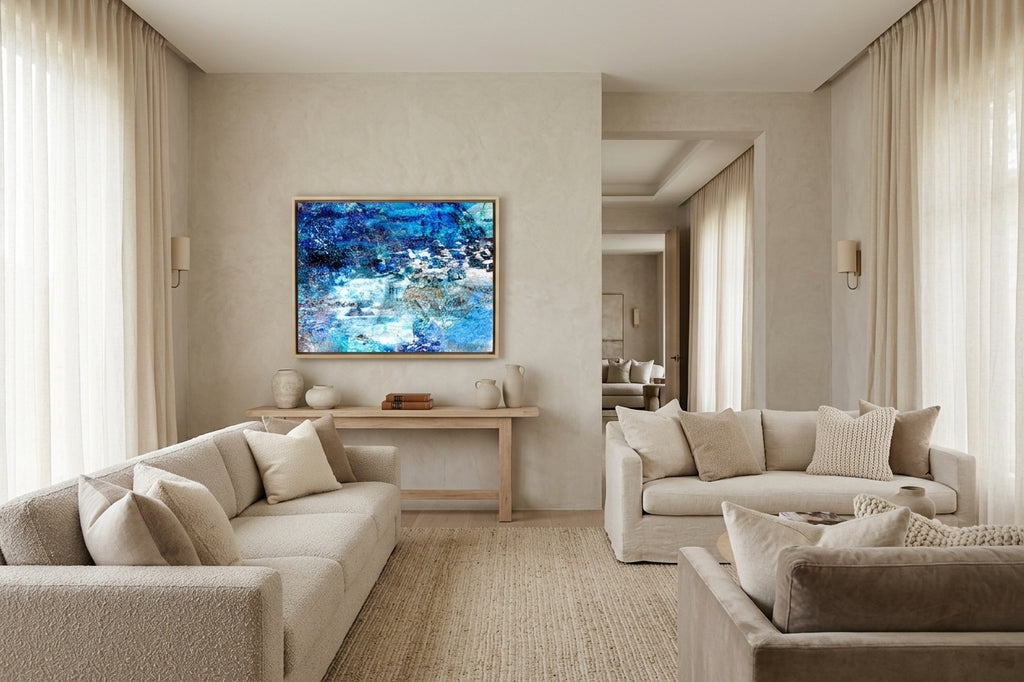 “The Depth of the Huts” Box framed archival canvas print by Durham J White, featuring a Japanese winter landscape artwork of snow-covered huts in cool whites, soft winter blues, and warm undertones of ochre and muted gold.
