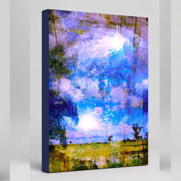 “The Electric Land” archival canvas print by Durham J White, featuring a layered photographic artwork of an expansive cloudscape over the Australian countryside in vivid cobalt, electric blues, luminous whites, and warm mauve eucalyptus tones.