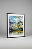 "The Rise" glass framed fine art print by Durham J White, featuring a layered photographic artwork of Kyneton's Royal George Hotel reflected in an illusionary waterbody, in pristine sky blues, deep architectural shades, and natural surrounds.