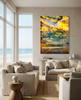 what looms… at one with the earth — archival canvas print by Durham J White featuring the Great Ocean Road layered photographic landscape in lush greens and warm gold and a mysterious silhouetted figure.  Styled in a coastal home.