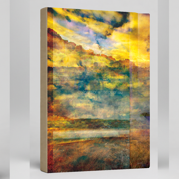 what looms… at one with the earth — archival canvas print by Durham J White featuring the Great Ocean Road layered photographic landscape in lush greens and warm gold and a mysterious silhouetted figure.