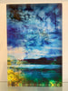 A decorative artwork featuring a stylized landscape with blue and green hues, and an image of a coral sea bed.