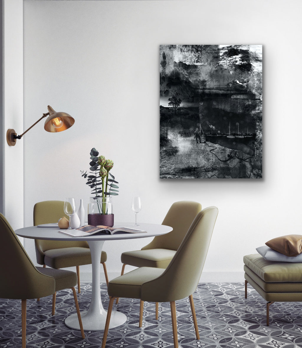 “Moonwalking” archival canvas print by Durham J White, featuring a layered photographic artwork of the Mornington Pier in monochrome with carbon blacks, graphite mid-tones, and crisp whites.  Featured in a modern hotel dining like interior.