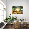 "Komorebi: Burnt Autumn Glow" archival canvas print by Durham J White, featuring a layered photographic artwork of sunlight blazing through an autumn forest canopy near Trentham, Victoria, in burnt amber, deep forest greens, and teal tones in an open living space.