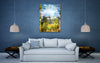 “Quaint” archival canvas print by Durham J White, featuring a layered photographic artwork of Trentham rooftops and chimneys in soft sky blues, crisp whites, and deep garden greens beneath a luminous sky. Featured in a living room.