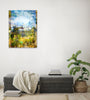 “Quaint” archival canvas print by Durham J White, featuring a layered photographic artwork of Trentham rooftops and chimneys in soft sky blues, crisp whites, and deep garden greens beneath a luminous sky. Set in a natural living space.