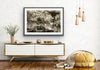 “Shades of the Historical Present Past” glass framed fine art print by Durham J White, featuring a monochromatic layered photographic artwork of Piper Street in Kyneton in rich greys, crisp whites, and ink blacks styled in an open natural white walled and timber floored living space.