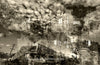 “Shades of the Historical Present Past” wall art by Durham J White, featuring a monochromatic layered photographic artwork of Piper Street in Kyneton in rich greys, crisp whites, and ink blacks in a semi-abstract way with dramatic clouds.