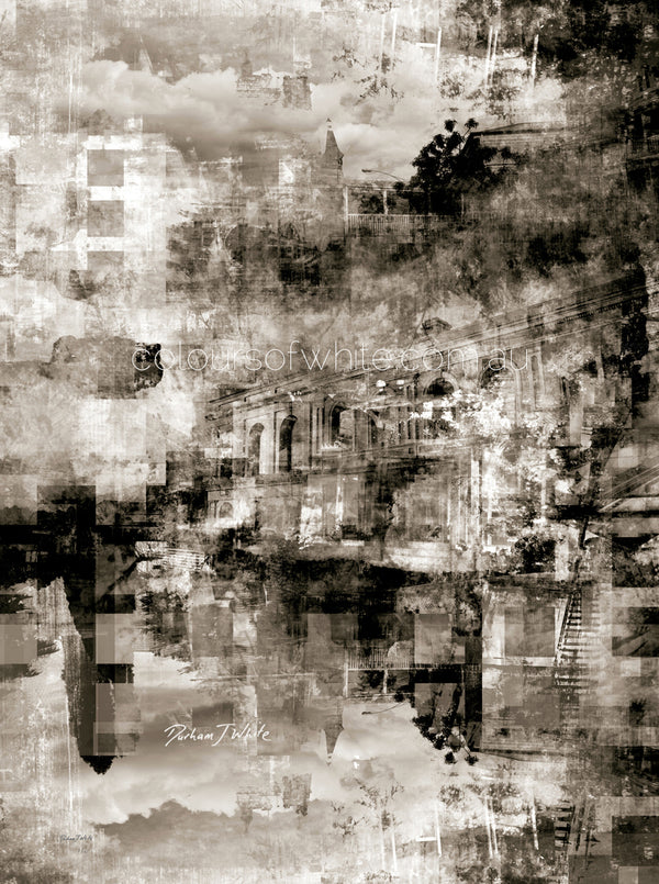 “The Prestige” archival canvas print by Durham J White, featuring a layered photographic artwork of Piper Street, Kyneton, with dramatic cloudscape and surrounding countryside rendered in deep velvety blacks and layered mid-tone greys with cinematic monochromatic depth.