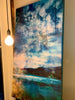 "What Looms… Smooth Sailing Between the Shores" archival canvas print by Durham J White, featuring a layered photographic artwork of the Great Ocean Road coastline with sea vessels, a bird in flight, deep oceanic blues and greens, and a golden coral seabed glow.