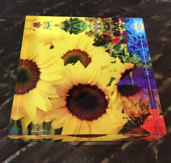 A free standing tile with a retro psychedelic design featuring a gold square and a sunflower pattern in vibrant colors on a yellow background.