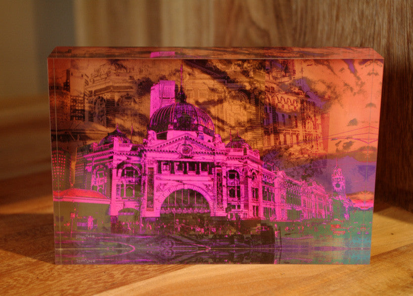 A pink abstract representation of the Melbourne Flinders Street Station.
