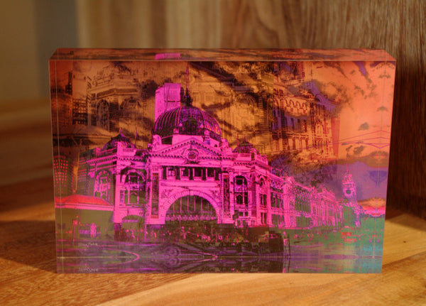 A pink abstract representation of the Melbourne Flinders Street Station.