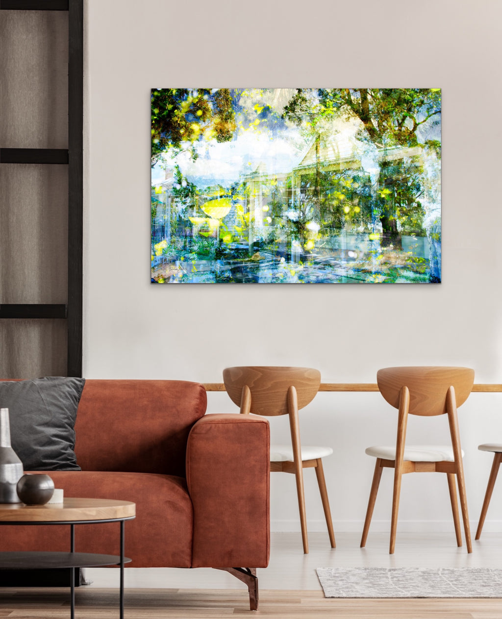 Glisten – Australian nature landscape by Durham J White. Sunlight catching lime and yellow leaves with a heritage cottage dissolving into a luminous layered photographic composition. Feautured on a wall in a minimal Scandinavian like interior